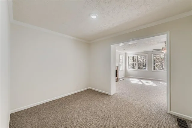 an empty room with windows