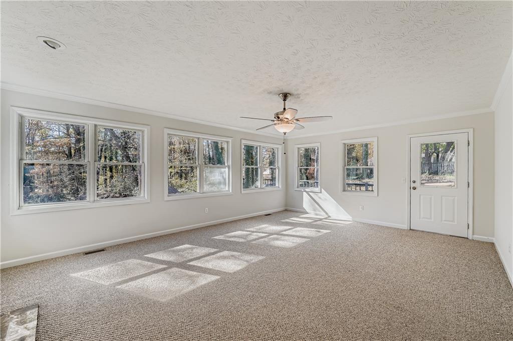 6797 Campground Road Cumming, GA 30040 - Photo 15 of 28 a view of empty room with windows
