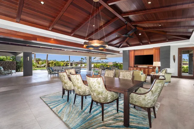 a dining room with furniture and outdoor view