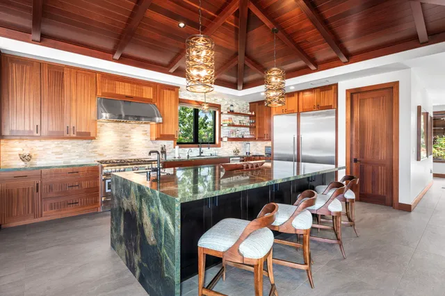 a terrace with outdoor seating and city view