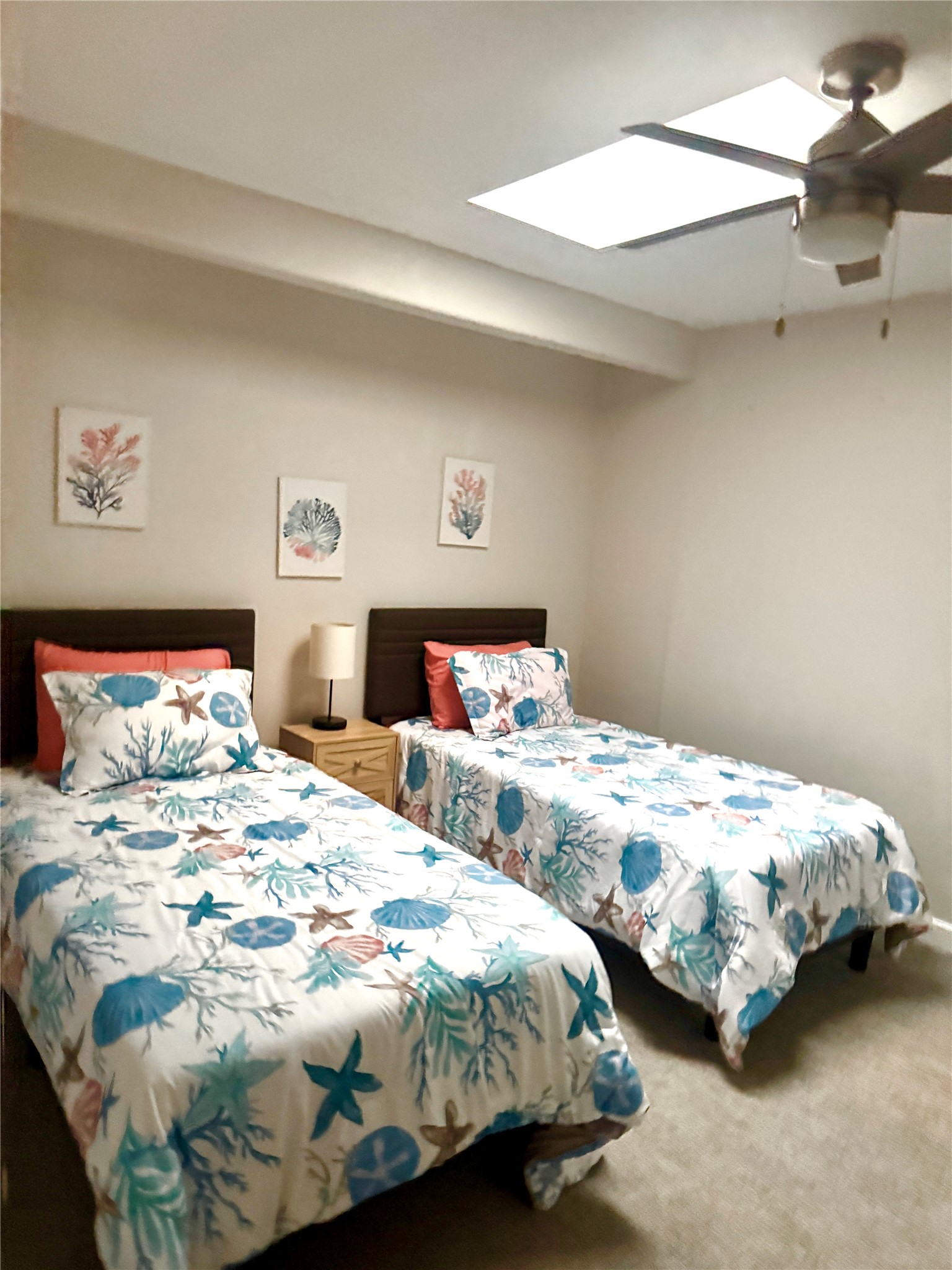 10429 Schaper Road Galveston, TX 77554 - Photo 5 of 31 Secondary bedroom with sky lights and large closet!