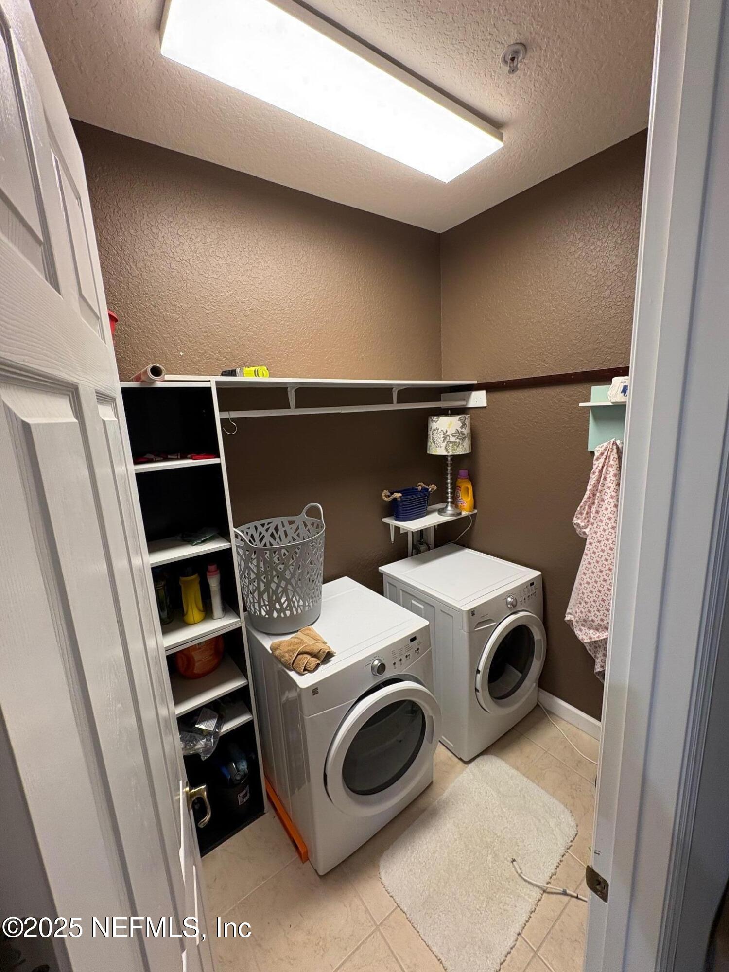 544 Market Street St. Augustine, FL 32095 - Photo 12 of 17 a utility room with dryer and washer