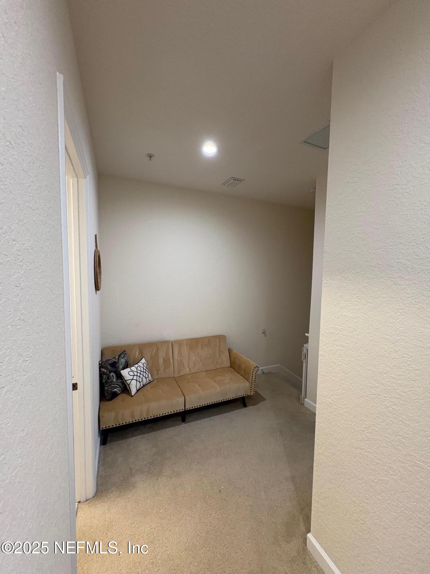 544 Market Street St. Augustine, FL 32095 - Photo 13 of 17 a bed room with a bed and a couch