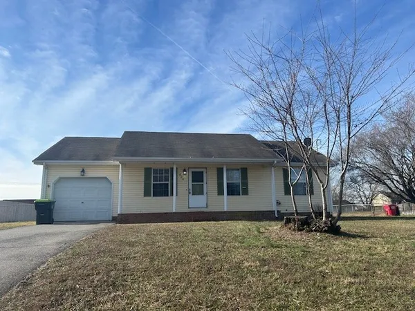 front view of a house with a dry yard