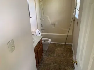 a bathroom with a sink and toilet