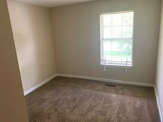 an empty room with a window