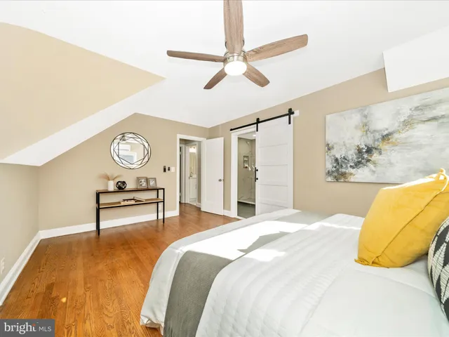 a view of room with window and hardwood floor