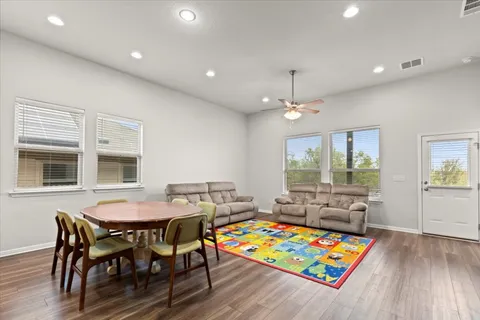 a kitchen with stainless steel appliances a sink stove cabinets and refrigerator