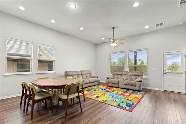 a kitchen with stainless steel appliances a sink stove cabinets and refrigerator