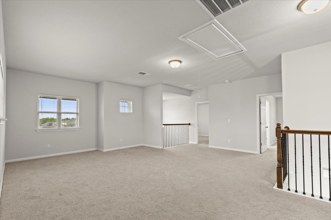 213 Munk Lane Leander, TX 78641 - Photo 21 of 40 a view of an empty room with a window