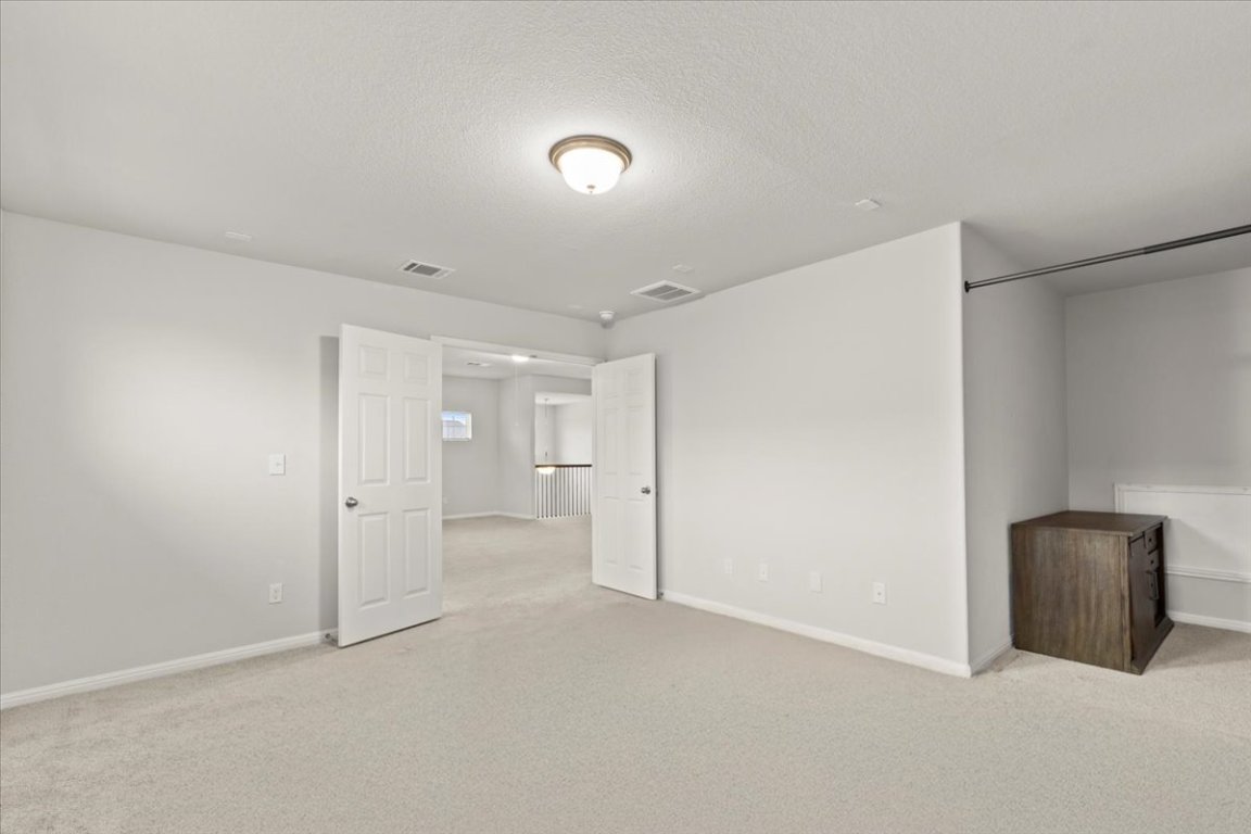 213 Munk Lane Leander, TX 78641 - Photo 24 of 40 a view of an empty room