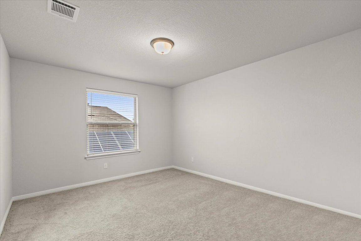 213 Munk Lane Leander, TX 78641 - Photo 26 of 40 an empty room with a window