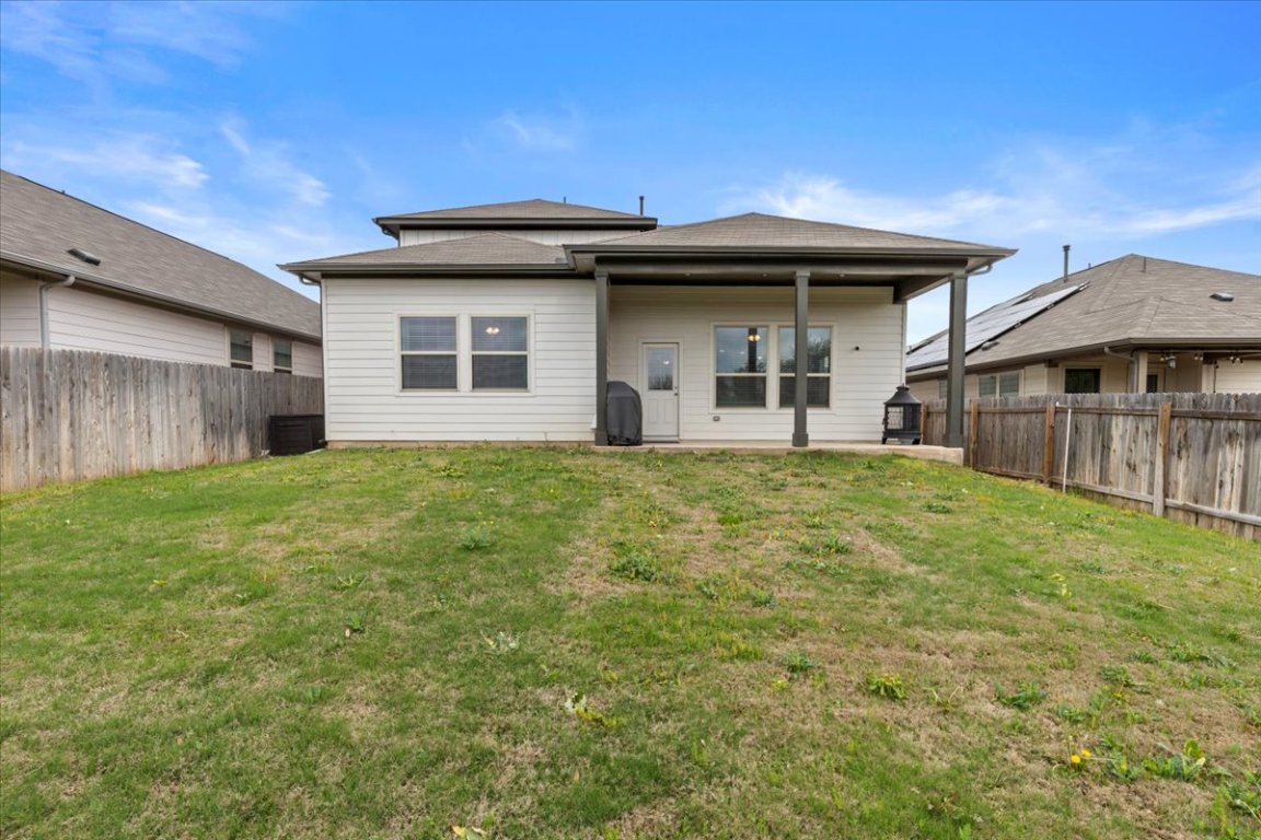 213 Munk Lane Leander, TX 78641 - Photo 35 of 40 a house view with a garden space