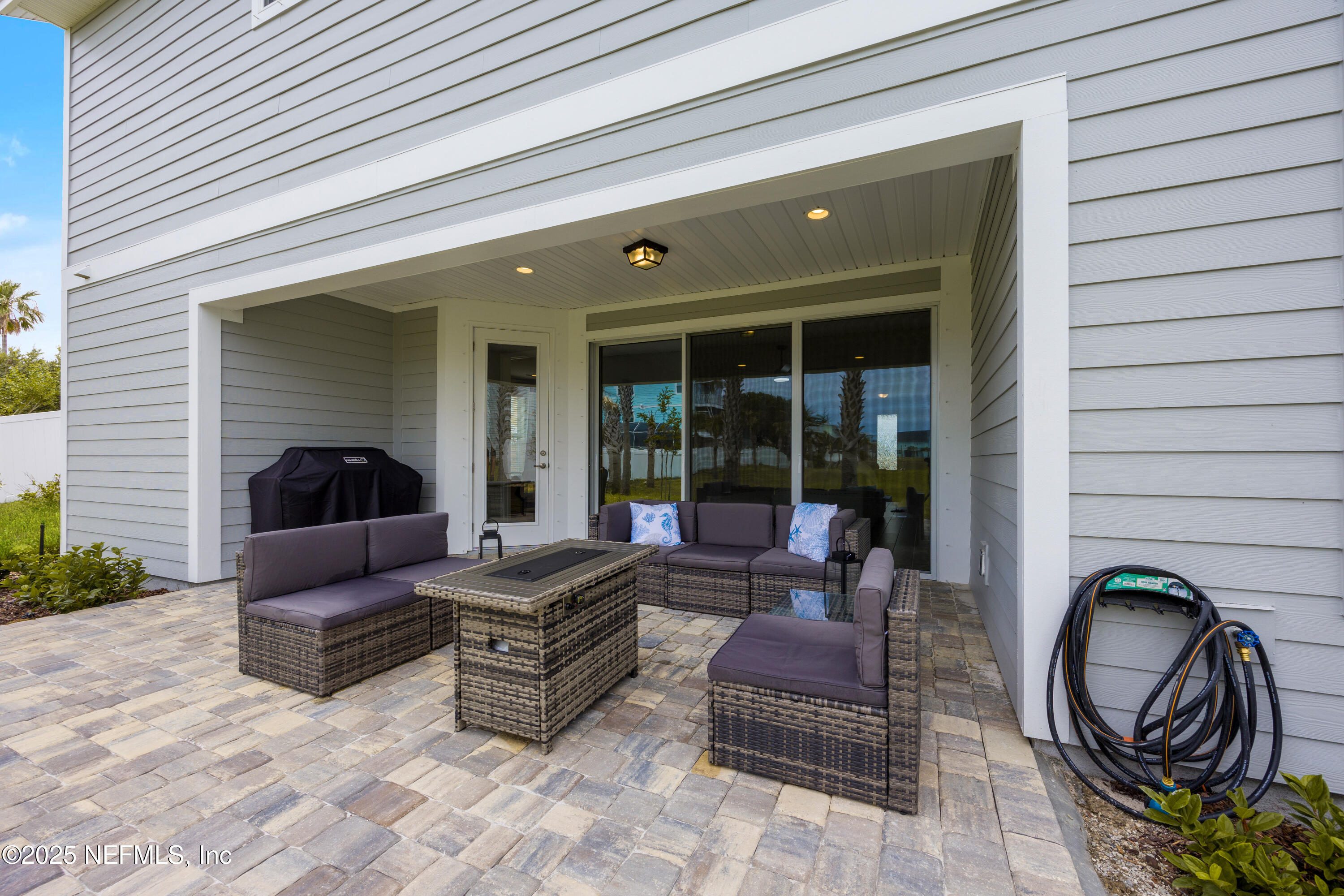 205 Seaside Vista Court St. Augustine, FL 32084 - Photo 28 of 35 Back Porch Hose Side