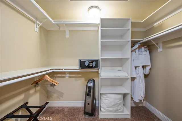 a view of a chairs and table in the balcony