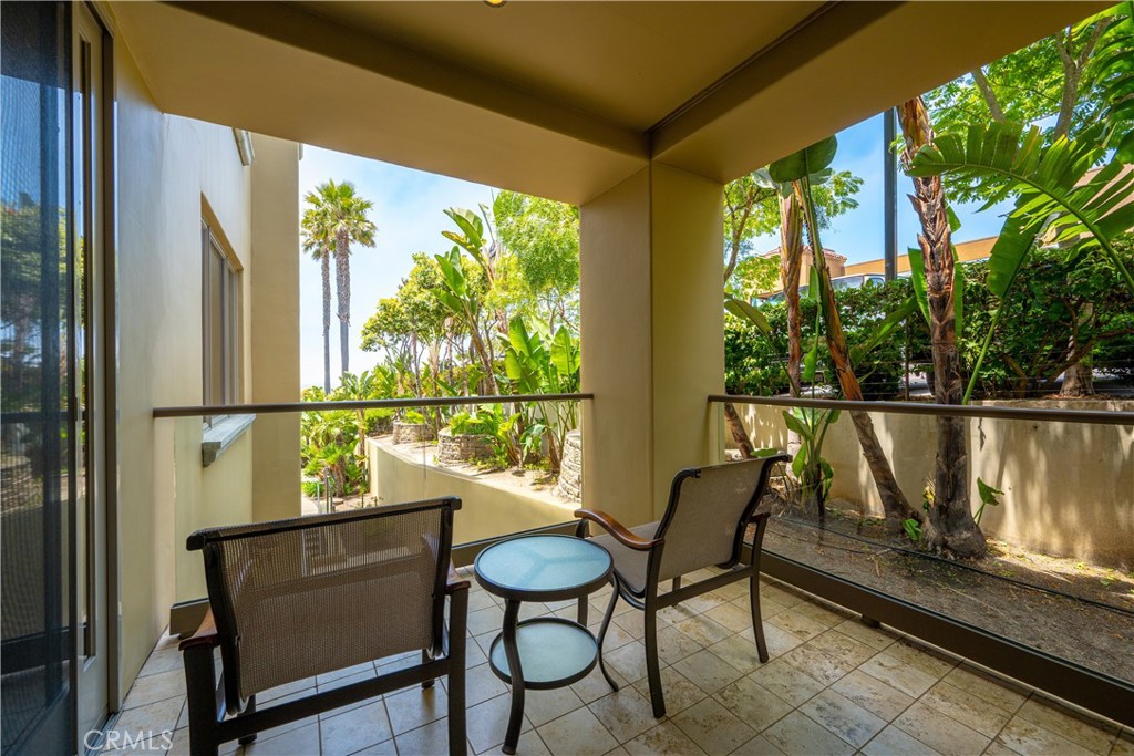 2727 Shell Beach Road, Unit 219 Pismo Beach, CA 93449 - Photo 20 of 35 a view of a chairs and table in the balcony