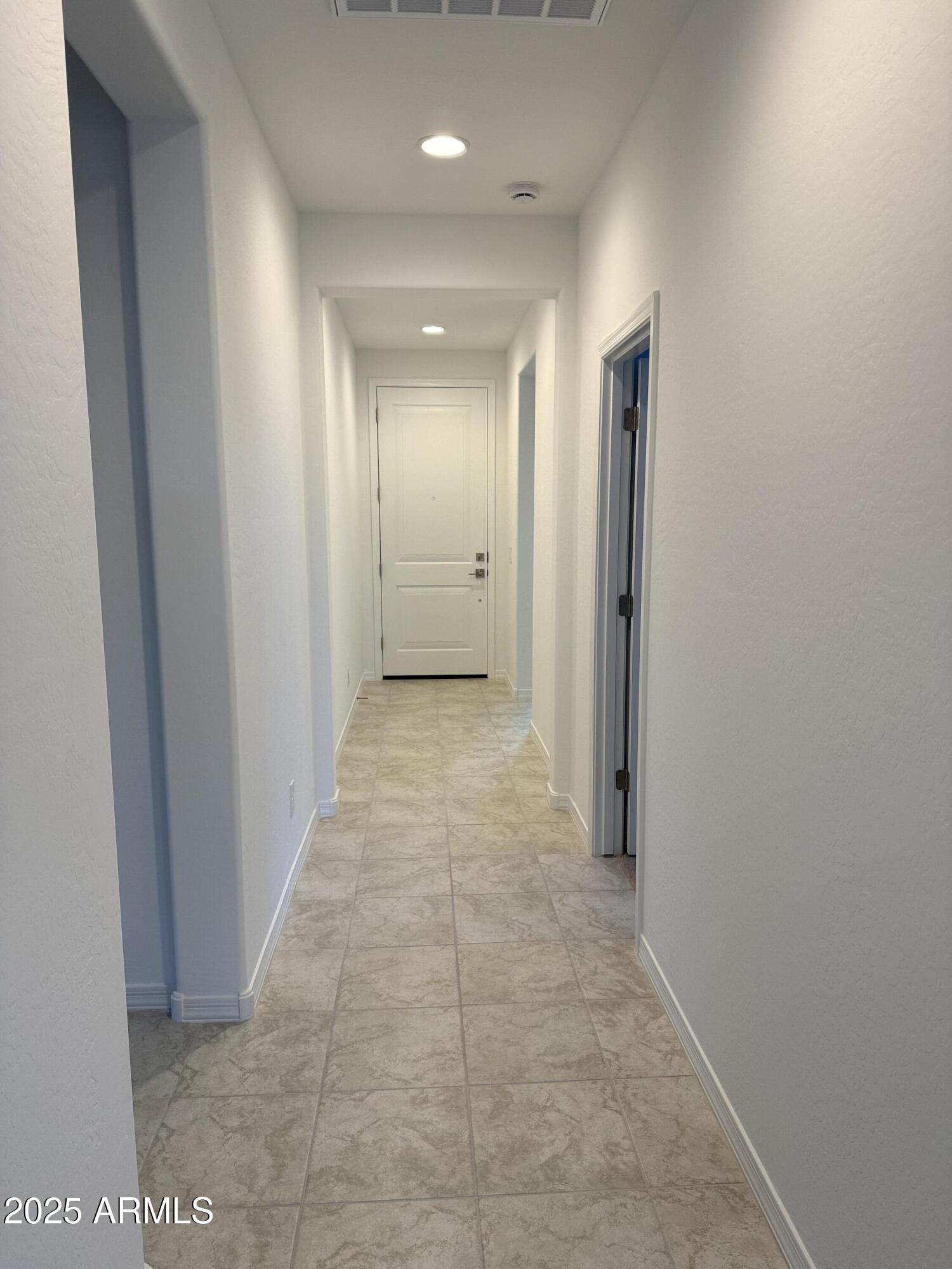9960 West Mitchell Avenue Avondale, AZ 85392 - Photo 13 of 25 a view of a hallway
