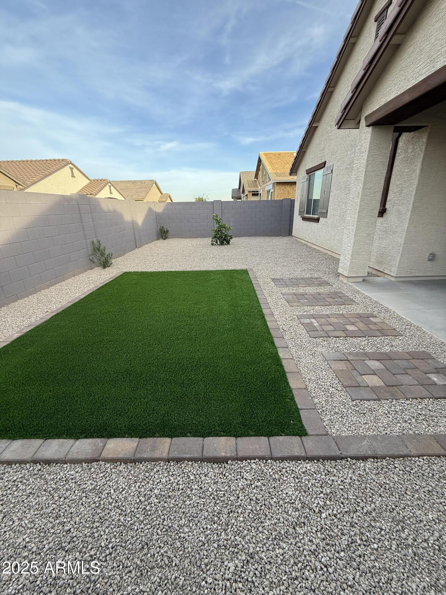 9960 West Mitchell Avenue Avondale, AZ 85392 - Photo 18 of 25 a view of a backyard