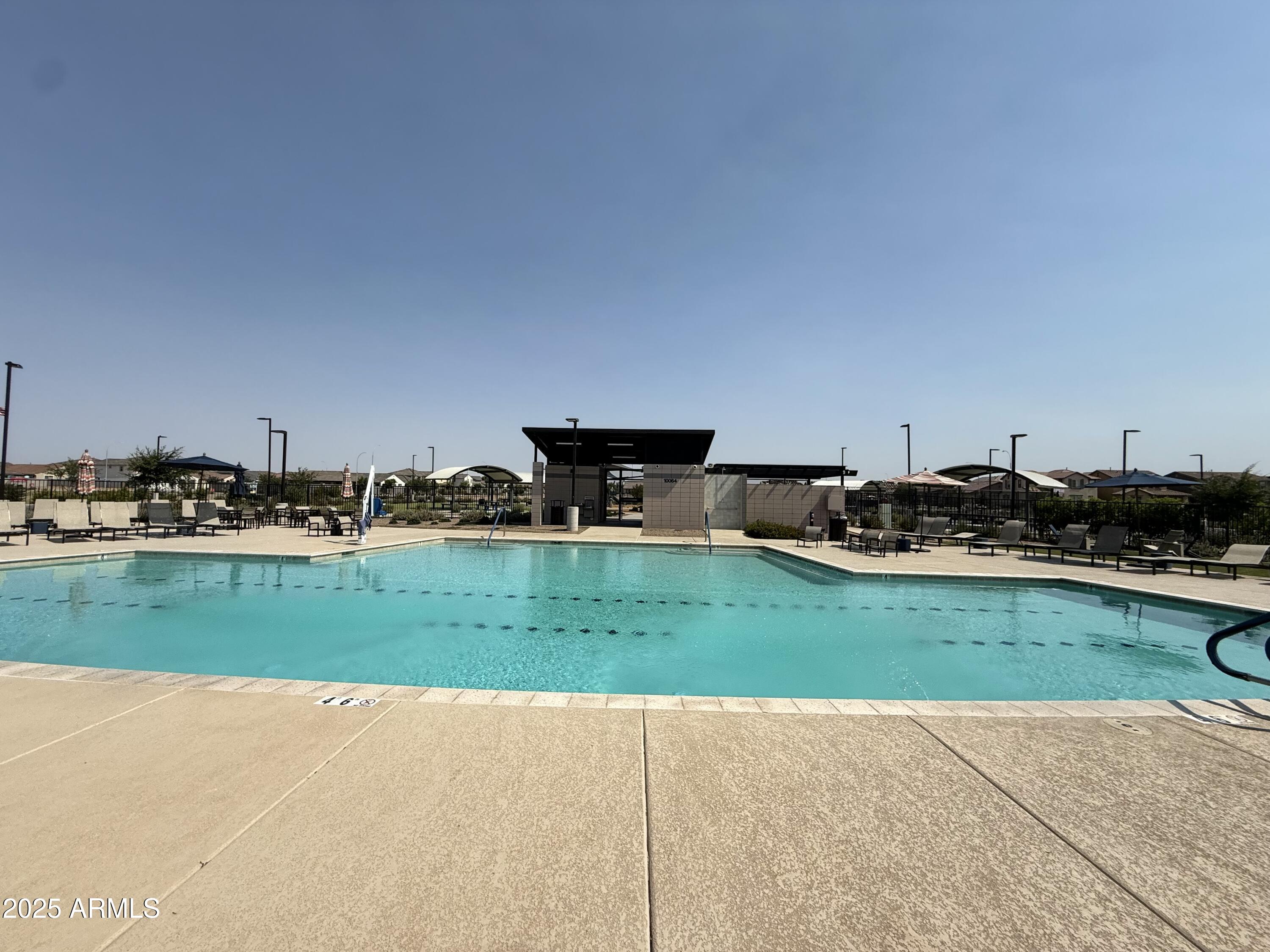 9960 West Mitchell Avenue Avondale, AZ 85392 - Photo 20 of 25 a backyard of a house and outdoor seating