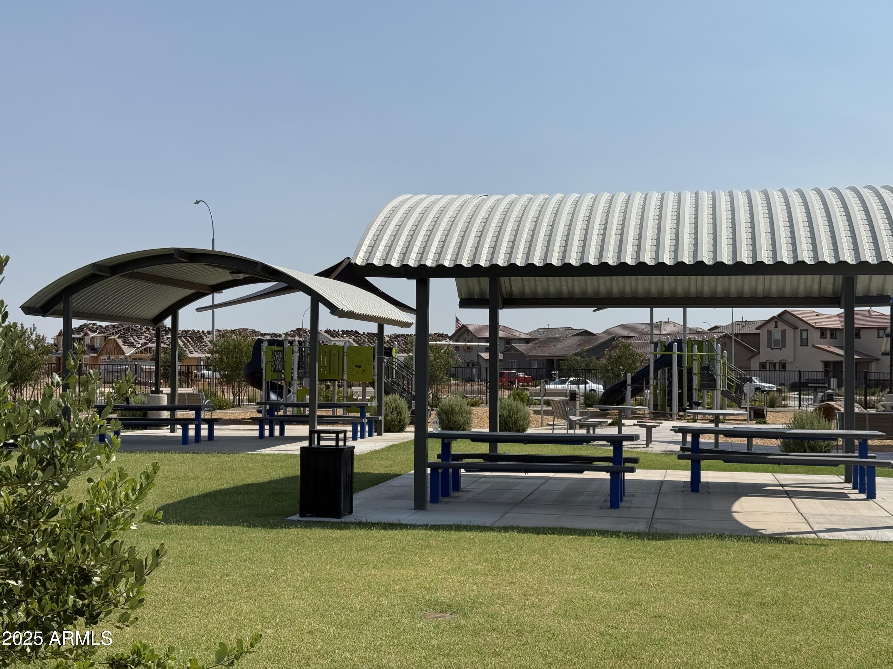 9960 West Mitchell Avenue Avondale, AZ 85392 - Photo 21 of 25 a view of swimming pool with outdoor seating