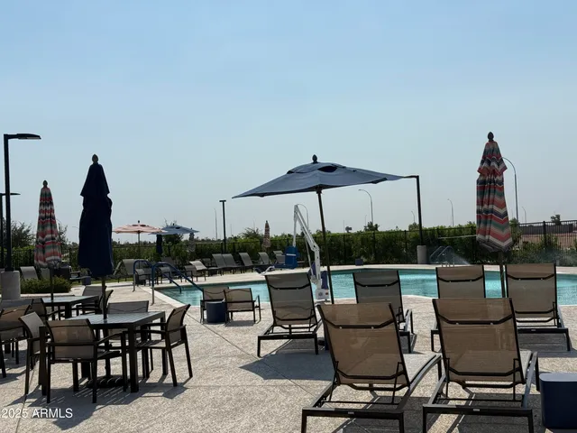 a view of a terrace with furniture