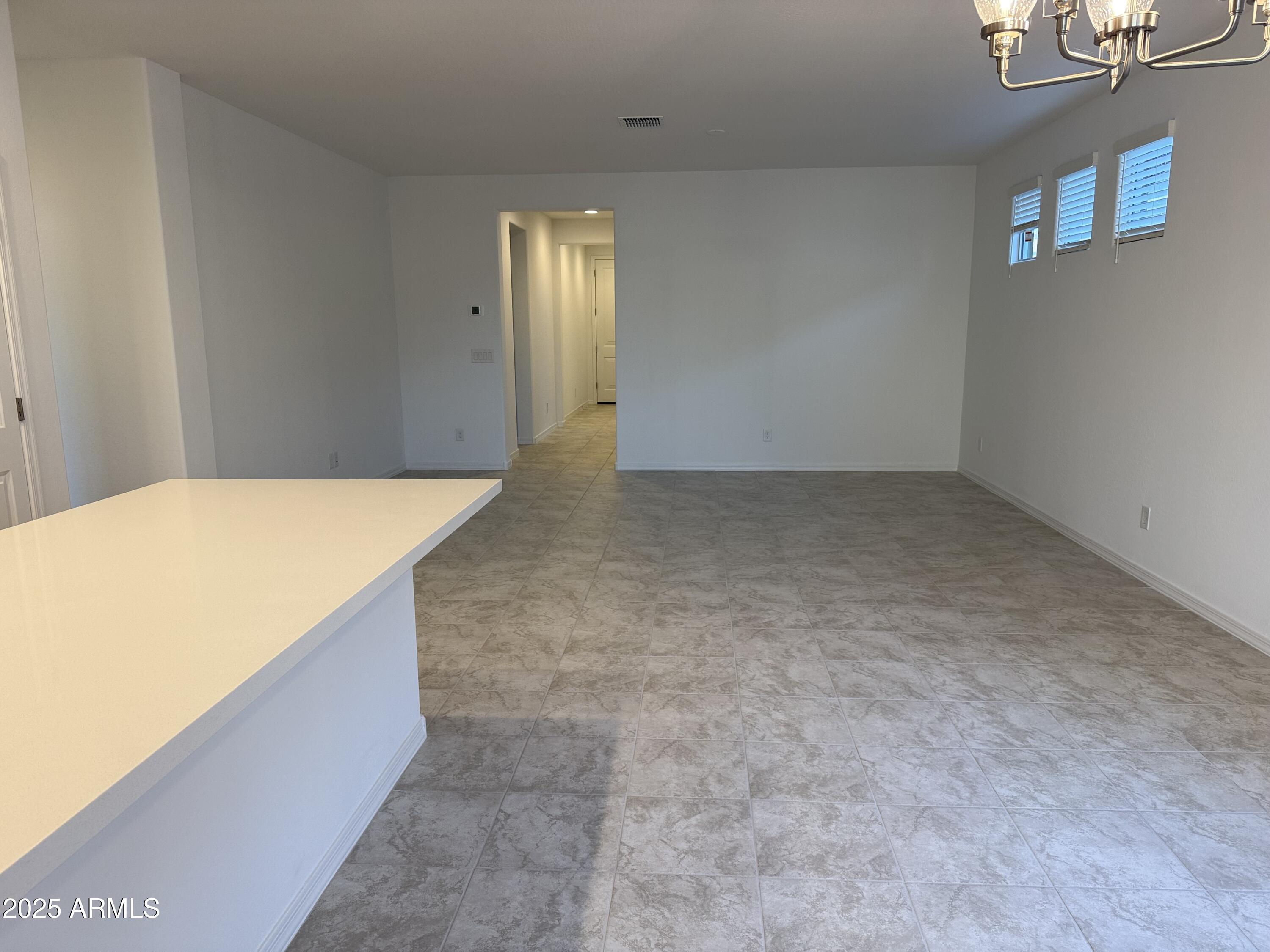 9960 West Mitchell Avenue Avondale, AZ 85392 - Photo 7 of 25 a view of an empty room