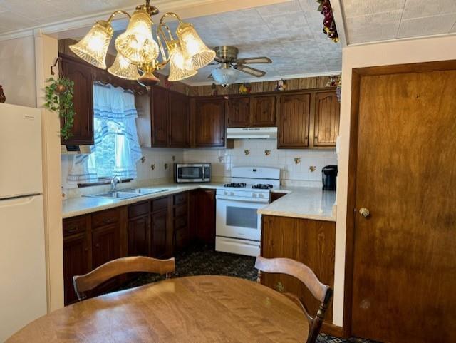 3938 Station Road New Castle, PA 16101 - Photo 5 of 23 a kitchen with a sink cabinets and stainless steel appliances