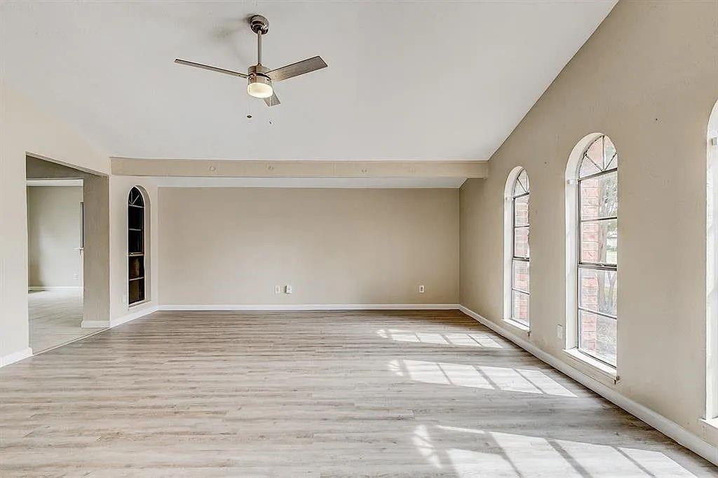 1316 Royster Road Fort Worth, TX 76134 - Photo 5 of 19 a view of an empty room with a window