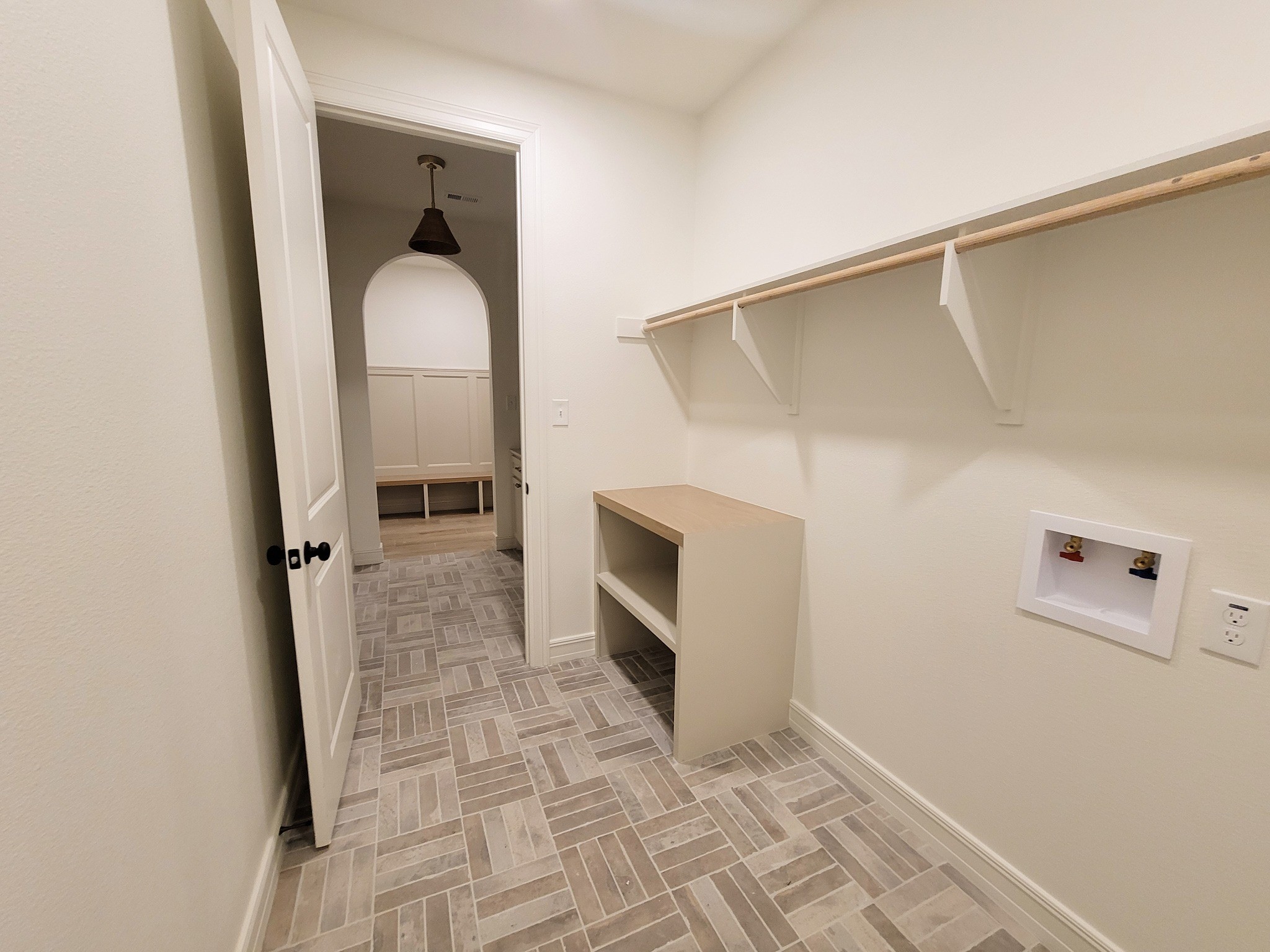 6202 Johnson Road Orange, TX 77632 - Photo 18 of 26 a view of a hallway with closet and a fireplace