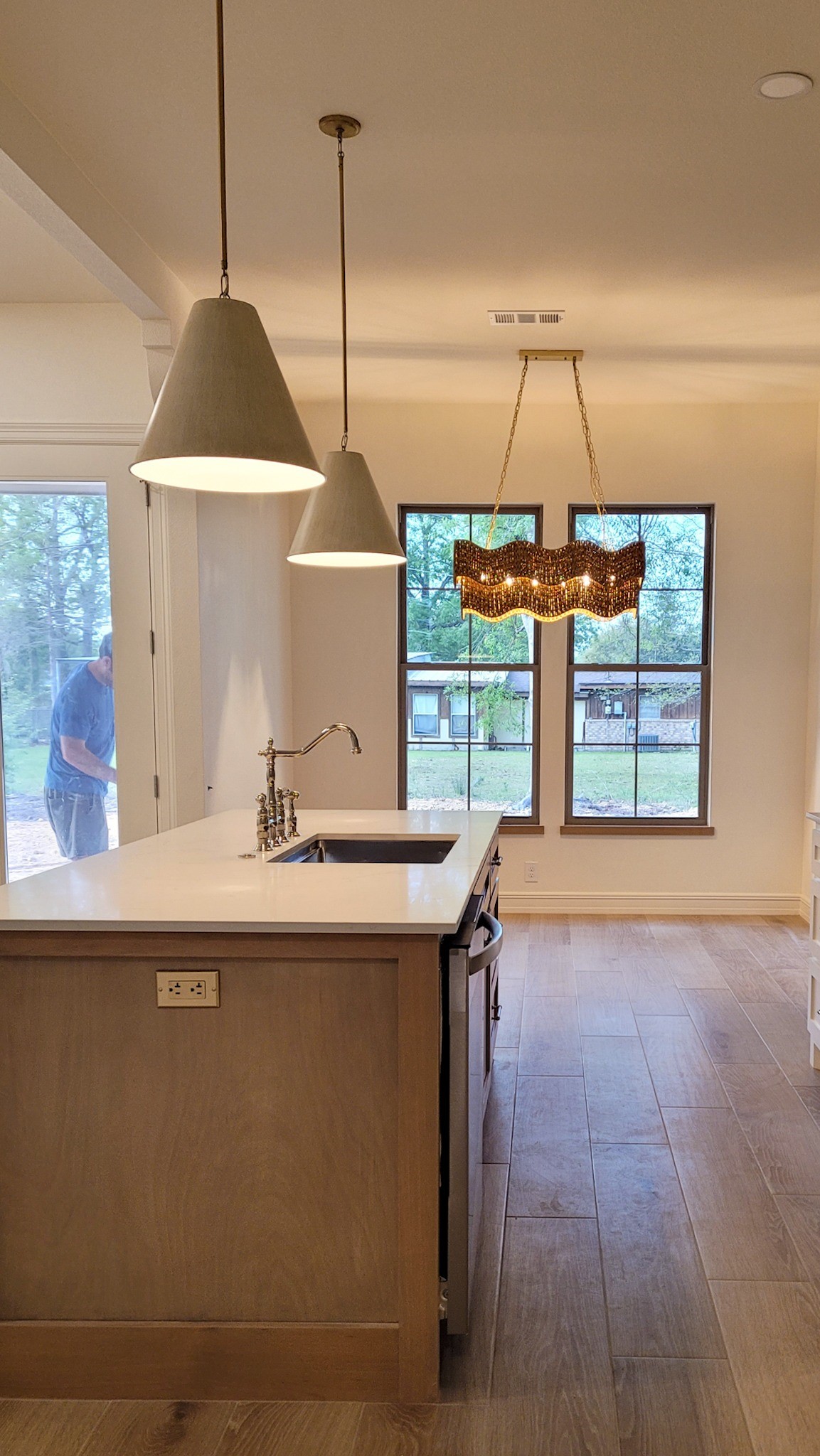 6202 Johnson Road Orange, TX 77632 - Photo 3 of 26 a kitchen with a sink a window and stainless steel appliances