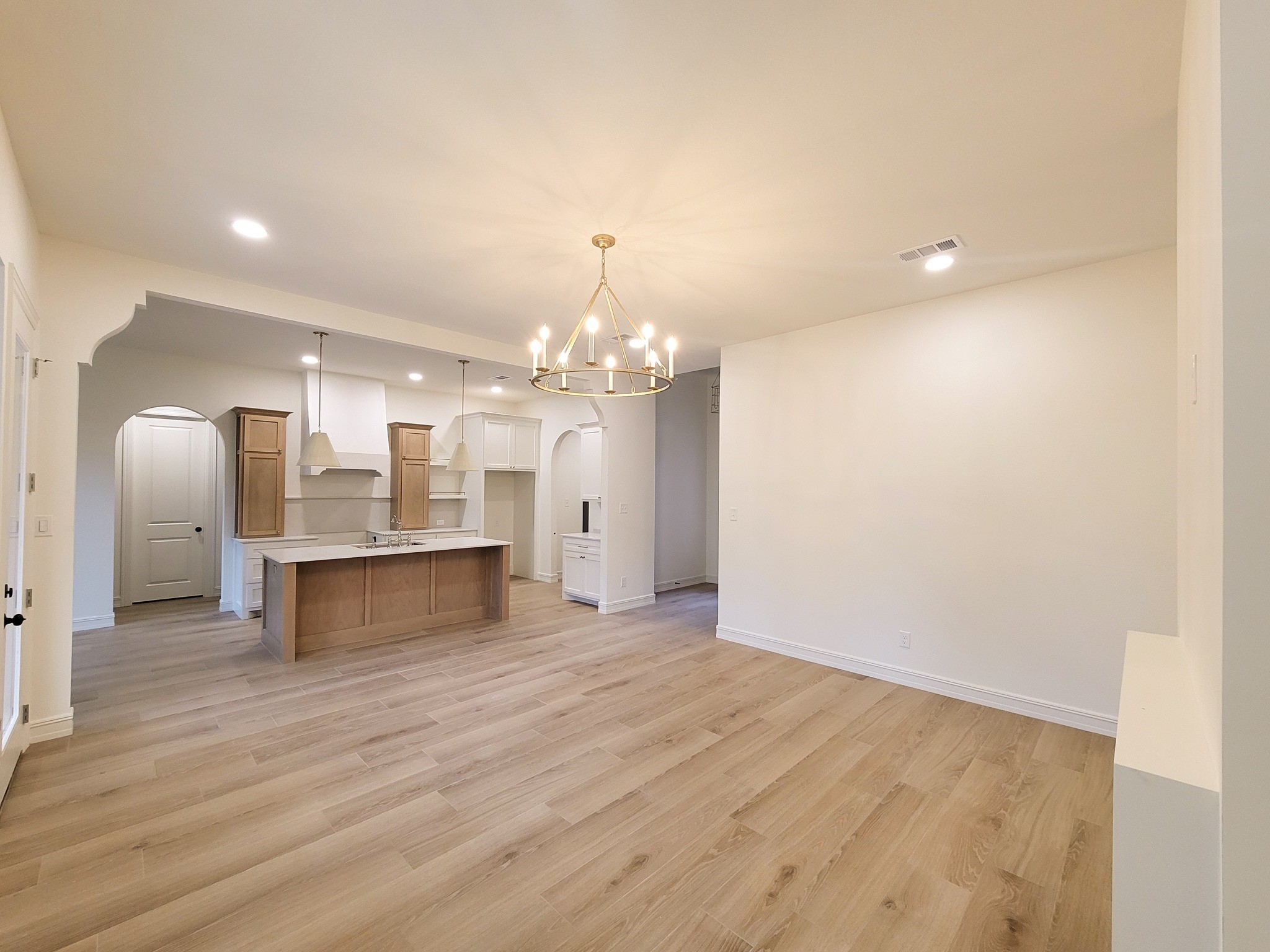 6202 Johnson Road Orange, TX 77632 - Photo 9 of 26 a view of a kitchen with a sink and a refrigerator