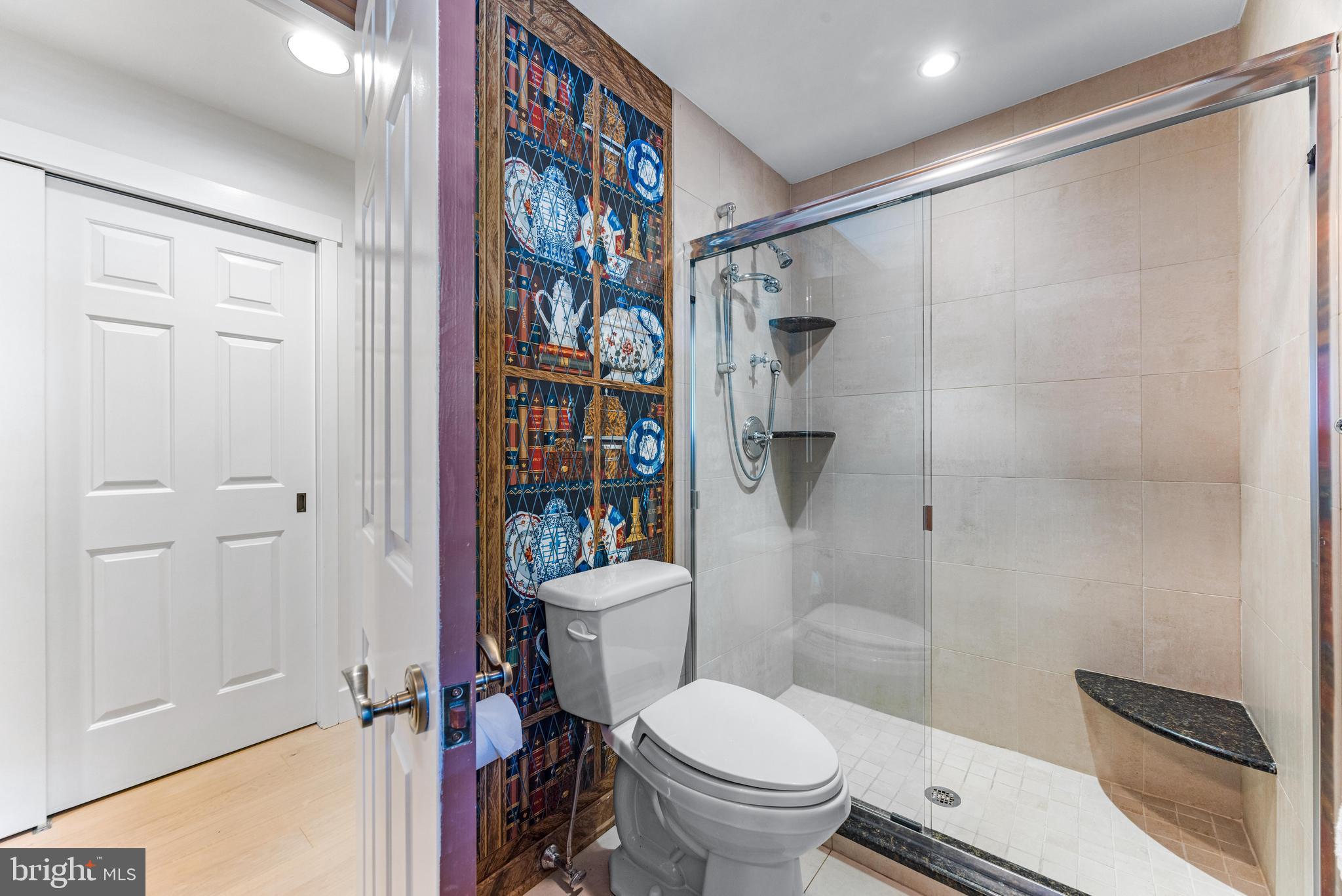 5 Tall Tree Court Baltimore, MD 21208 - Photo 41 of 78 a bathroom with a toilet and a shower