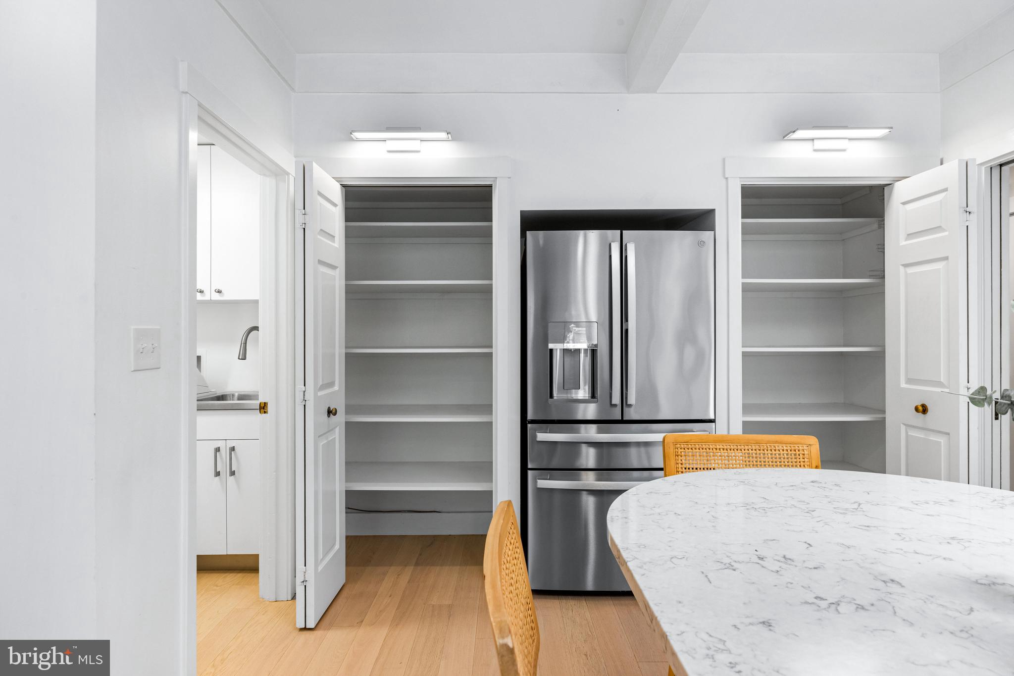 5 Tall Tree Court Baltimore, MD 21208 - Photo 55 of 78 a bedroom with a bed and a walk in closet