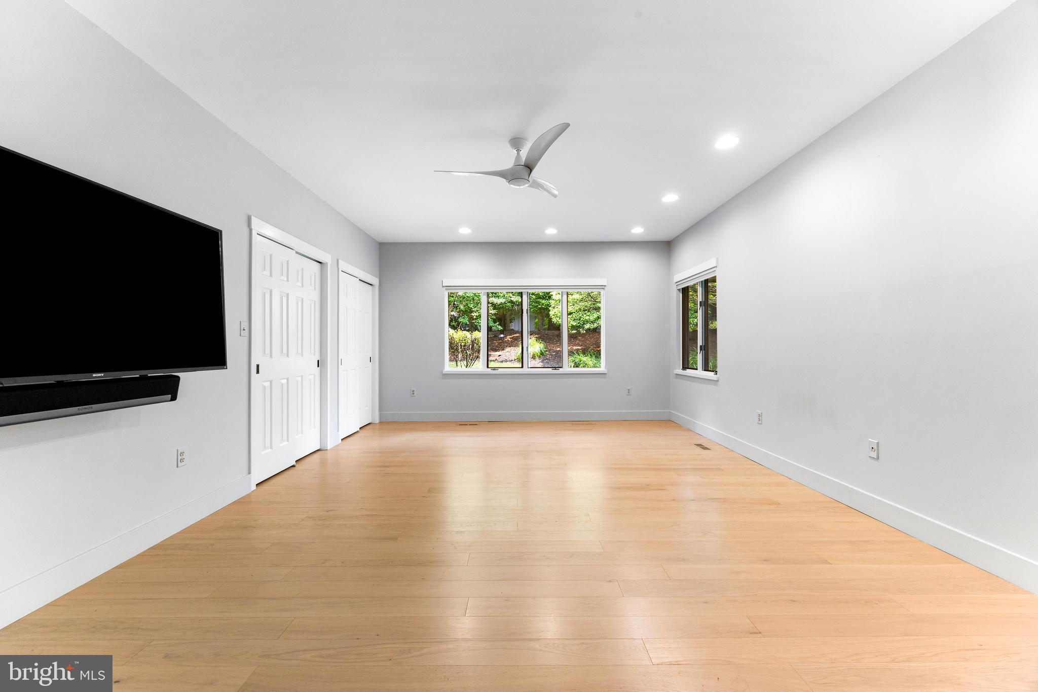 5 Tall Tree Court Baltimore, MD 21208 - Photo 57 of 78 a view of an empty room with a window