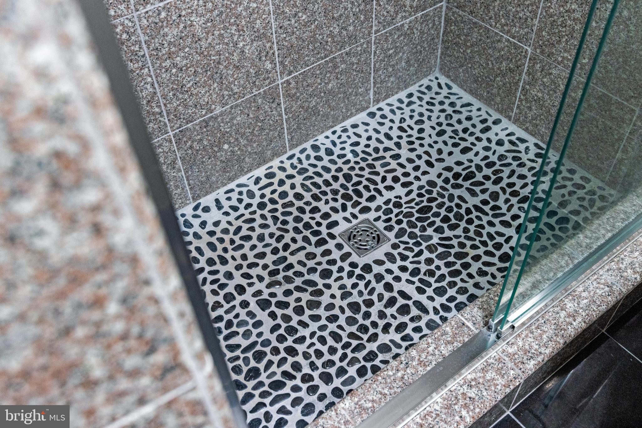 5 Tall Tree Court Baltimore, MD 21208 - Photo 63 of 78 a bathroom with a black white checkered floor