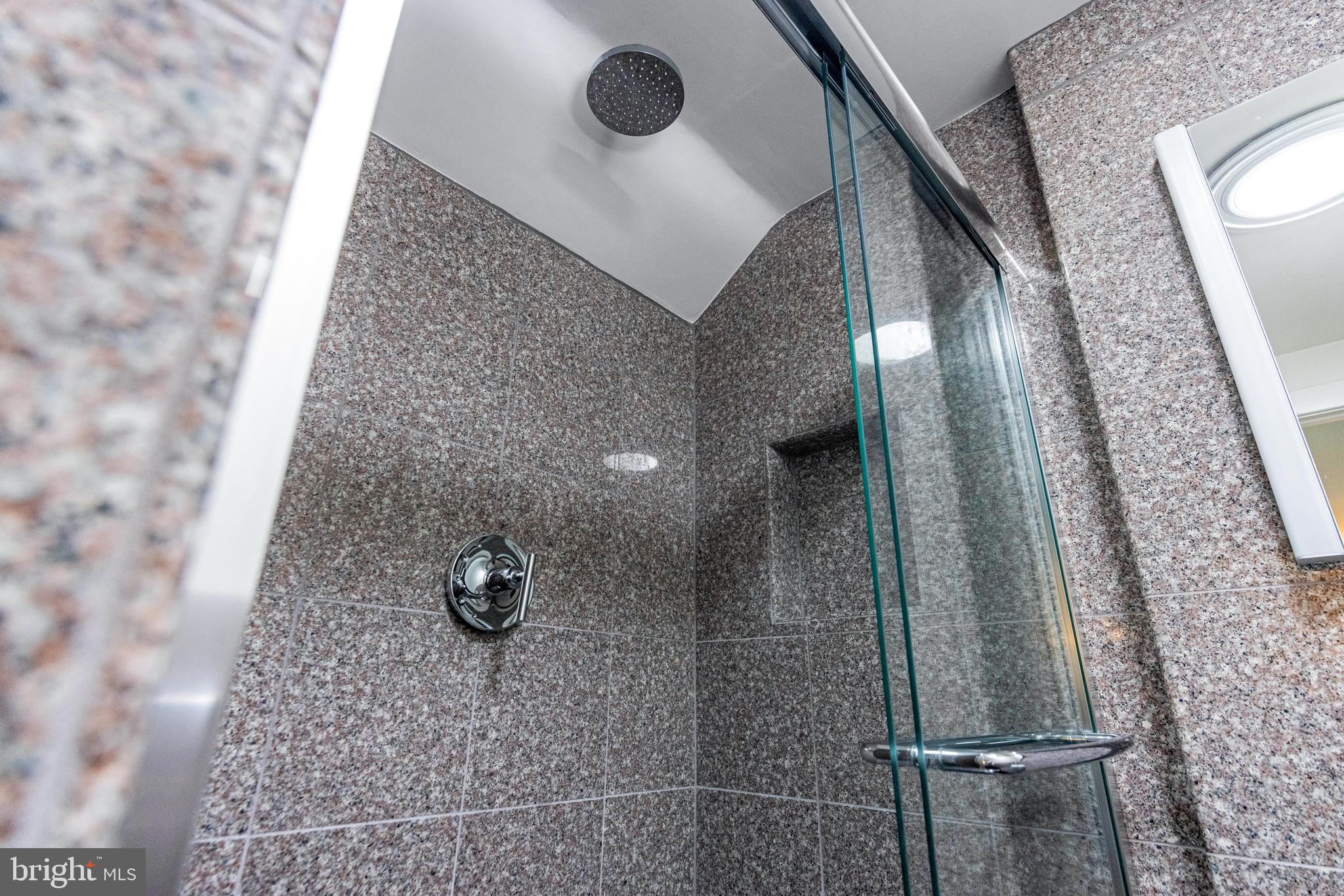 5 Tall Tree Court Baltimore, MD 21208 - Photo 64 of 78 a bathroom with a shower