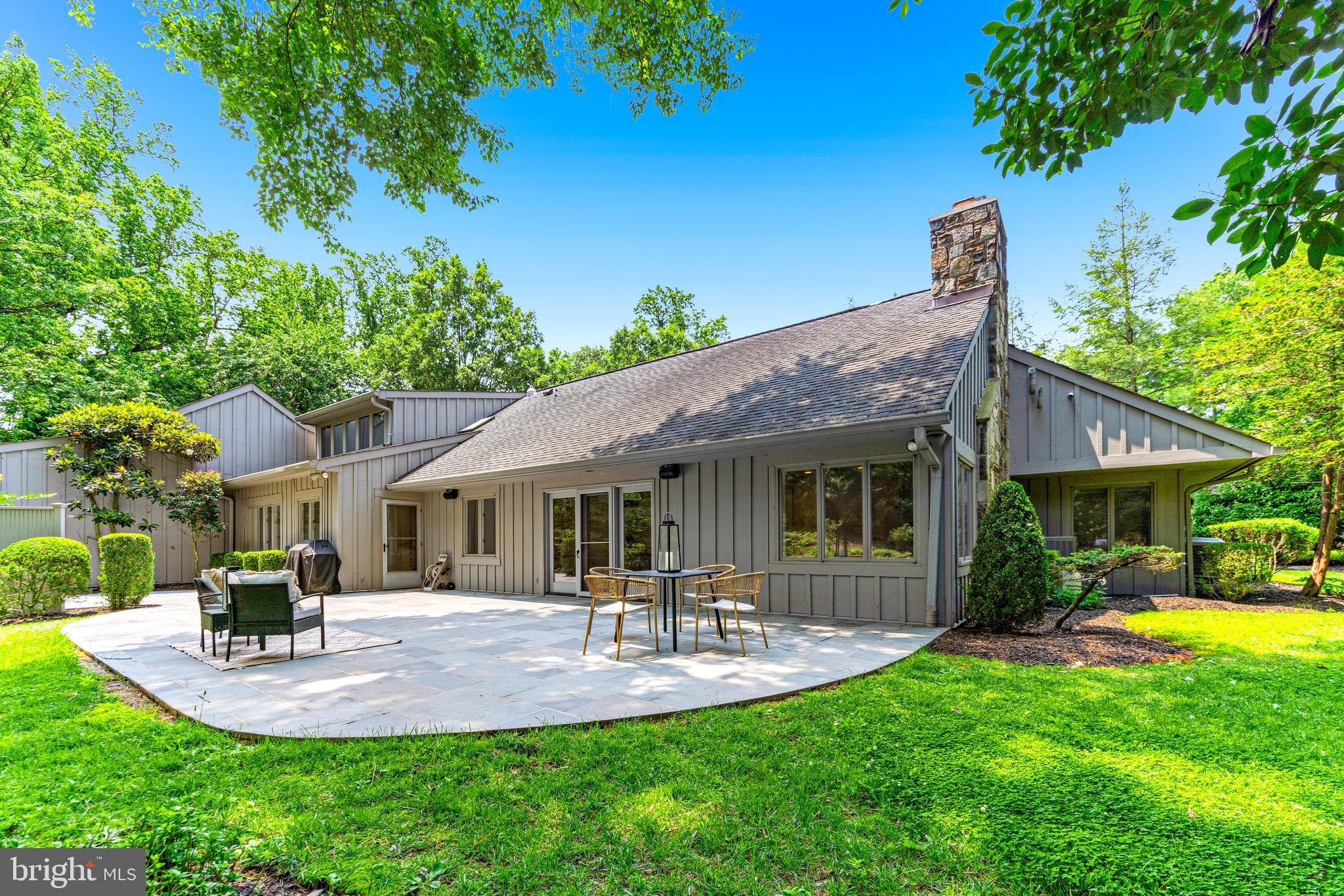 5 Tall Tree Court Baltimore, MD 21208 - Photo 68 of 78 a front view of a house with swimming pool yard and patio