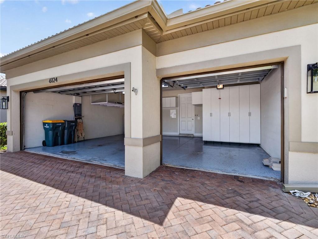 6124 Victory Drive Ave Maria, FL 34142 - Photo 42 of 50 a view of a hallway view with wooden floor and staircase
