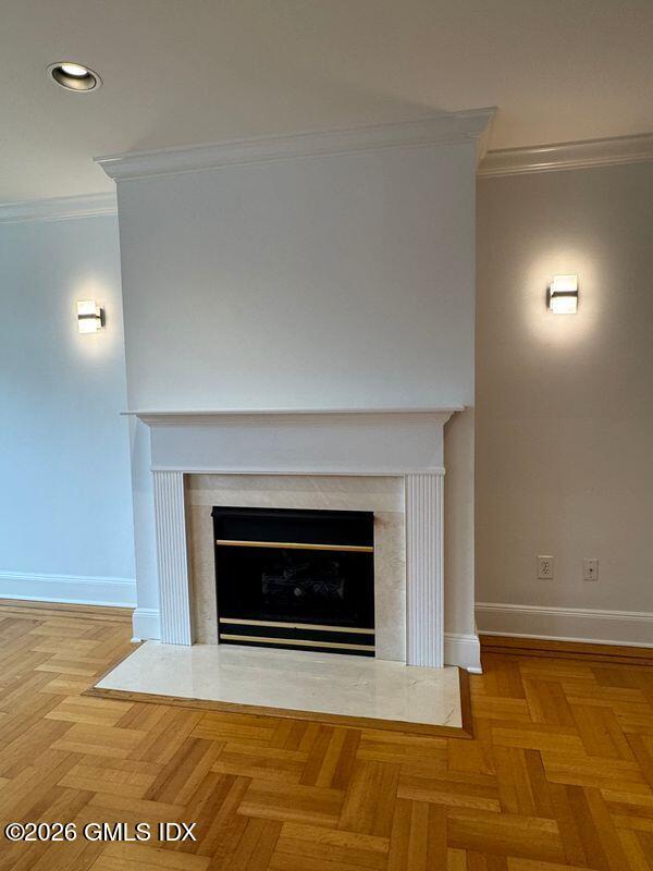 25 West Elm Street, Unit 40 Greenwich, CT 06830 - Photo 7 of 28 a view of an empty room with wooden floor fireplace and a window