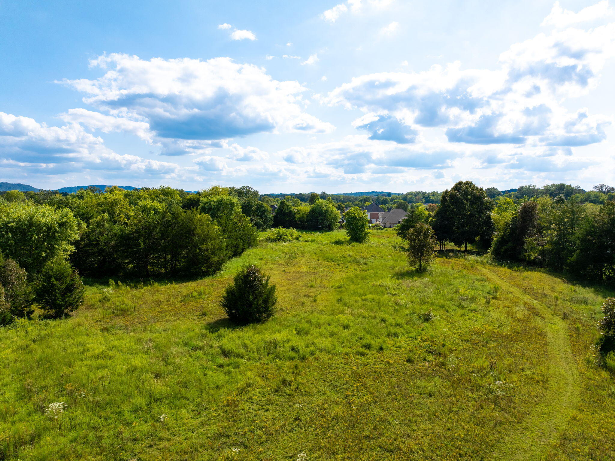 8502 Blanche Road Ooltewah, TN 37363 - Photo 8 of 16 14-web-or-mls-DJI_20250907145830_0238_D-