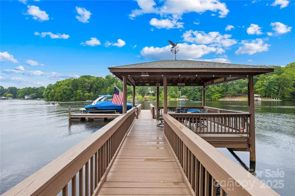 a view of a patio with wooden floor