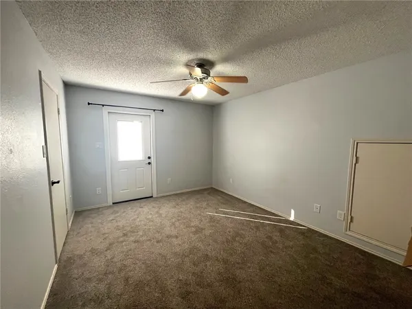 an empty room with closet