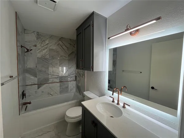 a view of a porch with wooden floor