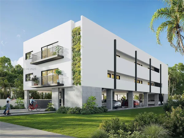 a view of a building with a yard