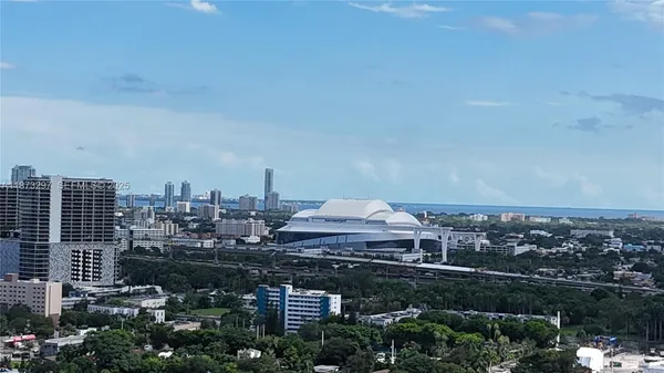 a view of a city with tall buildings