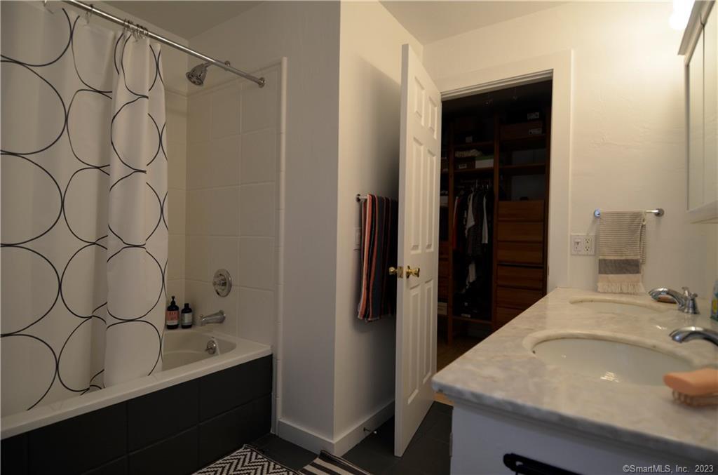 8 Chester Road Warren, CT 06754 - Photo 14 of 28 a bathroom with a sink and a mirror