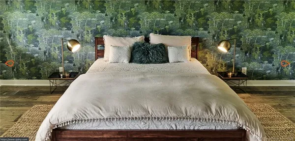 a bed sitting in a bedroom next to a yard