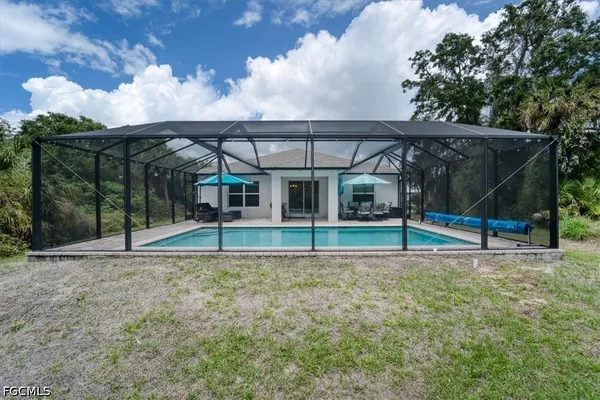 a view of a house with a park