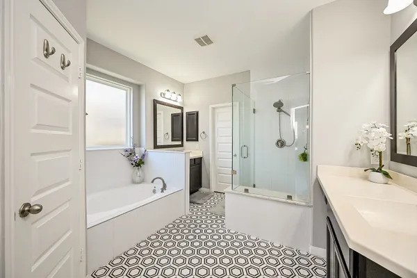 a bed room with a bed and a painting