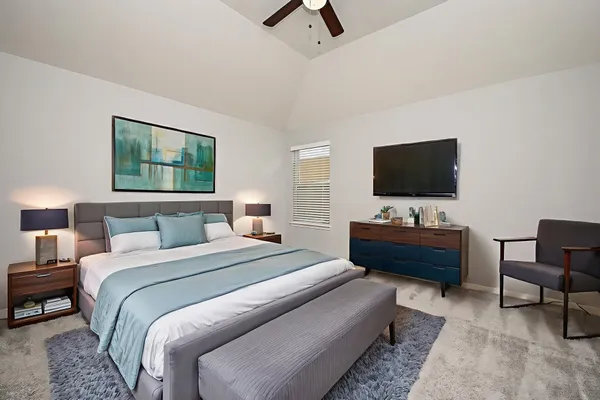 a bedroom with a bed and window